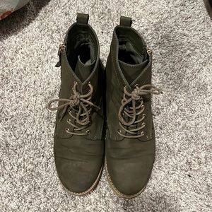 Olive green and gold boots.